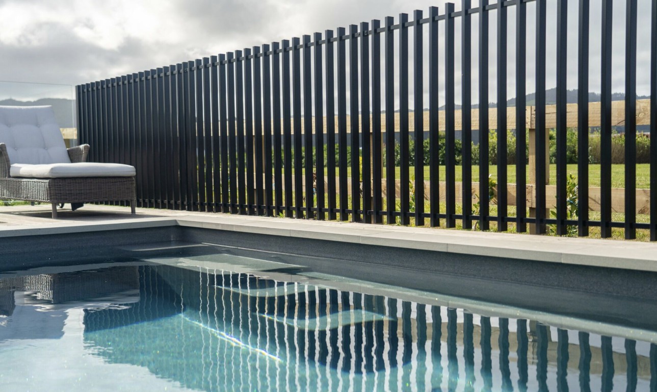 Modern aluminum pool fence with vertical slats for safety and style