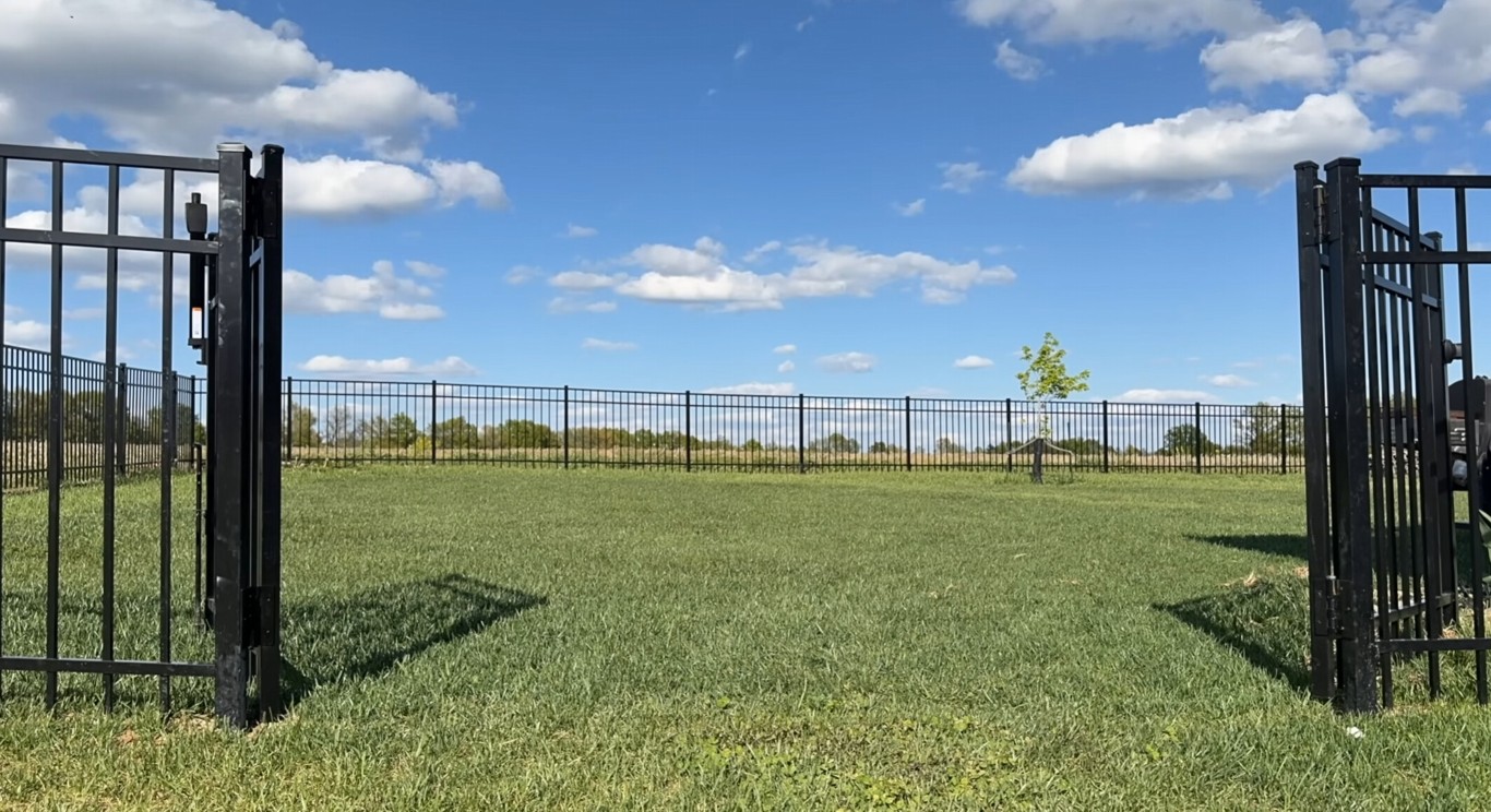 Black aluminum fence gates for modern residential property